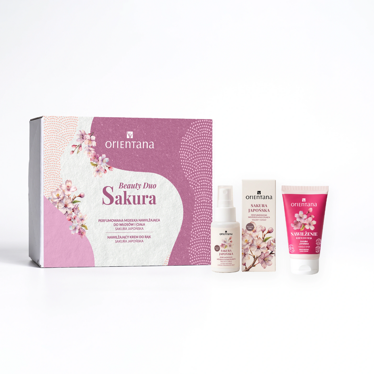 Zestaw prezentowy Sakura Beauty Duo Orientana – mgiełka do włosów i ciała oraz krem do rąk obok pudełka prezentowego.